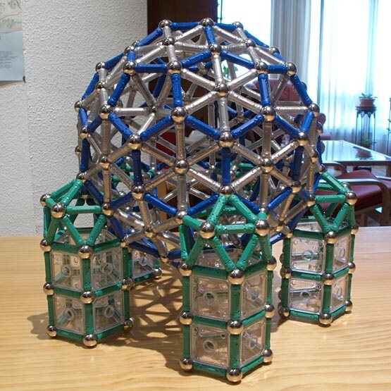 GEOMAG constructions: Pseudogeodesic sphere over five pentagonal supports