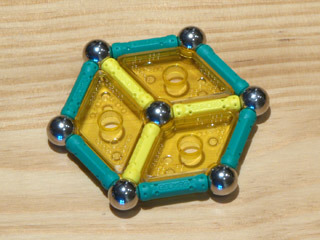GEOMAG constructions: Regular hexagon with auxiliary rods and rhombuses