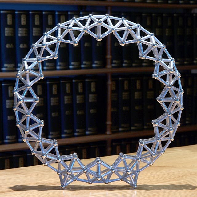 GEOMAG constructions: Ring of 16 sphenocoronae in an upright position