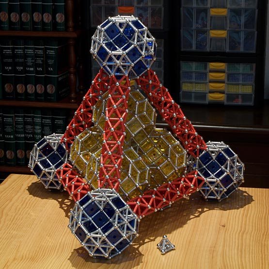 GEOMAG constructions: Giant tetrahedron filled with giant balls