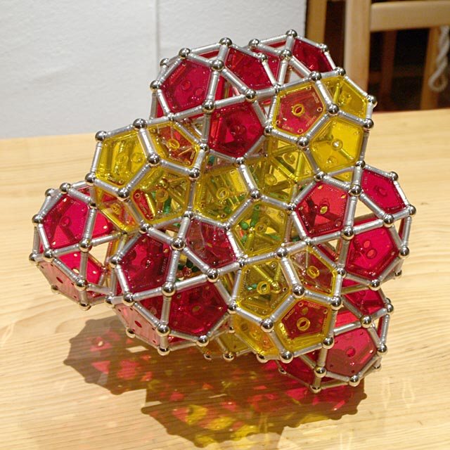 GEOMAG constructions: Twelve icosahedra, eight dodecahedra, twelve icosidodecahedra, and another twelve dodecahedra around a rhombicosidodecahedron (incomplete)