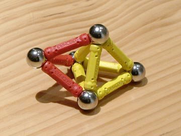 GEOMAG constructions: Aggregate of two tetrahedra
